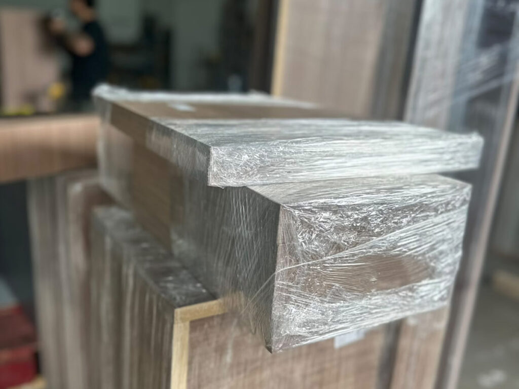 Cabinet parts labeled, wrapped and staged for pickup or delivery